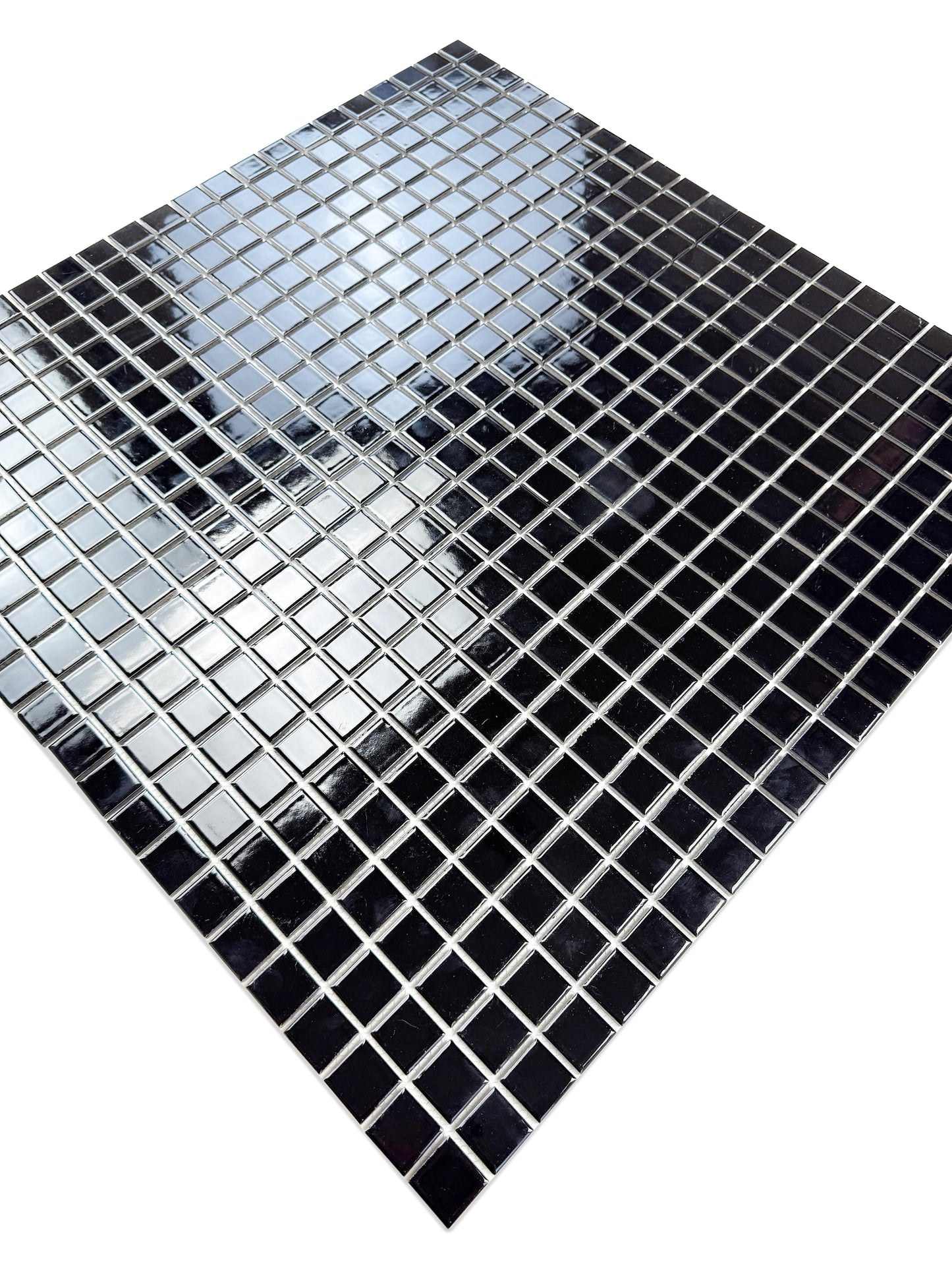 Mosaic tile pattern with black squares on a white background