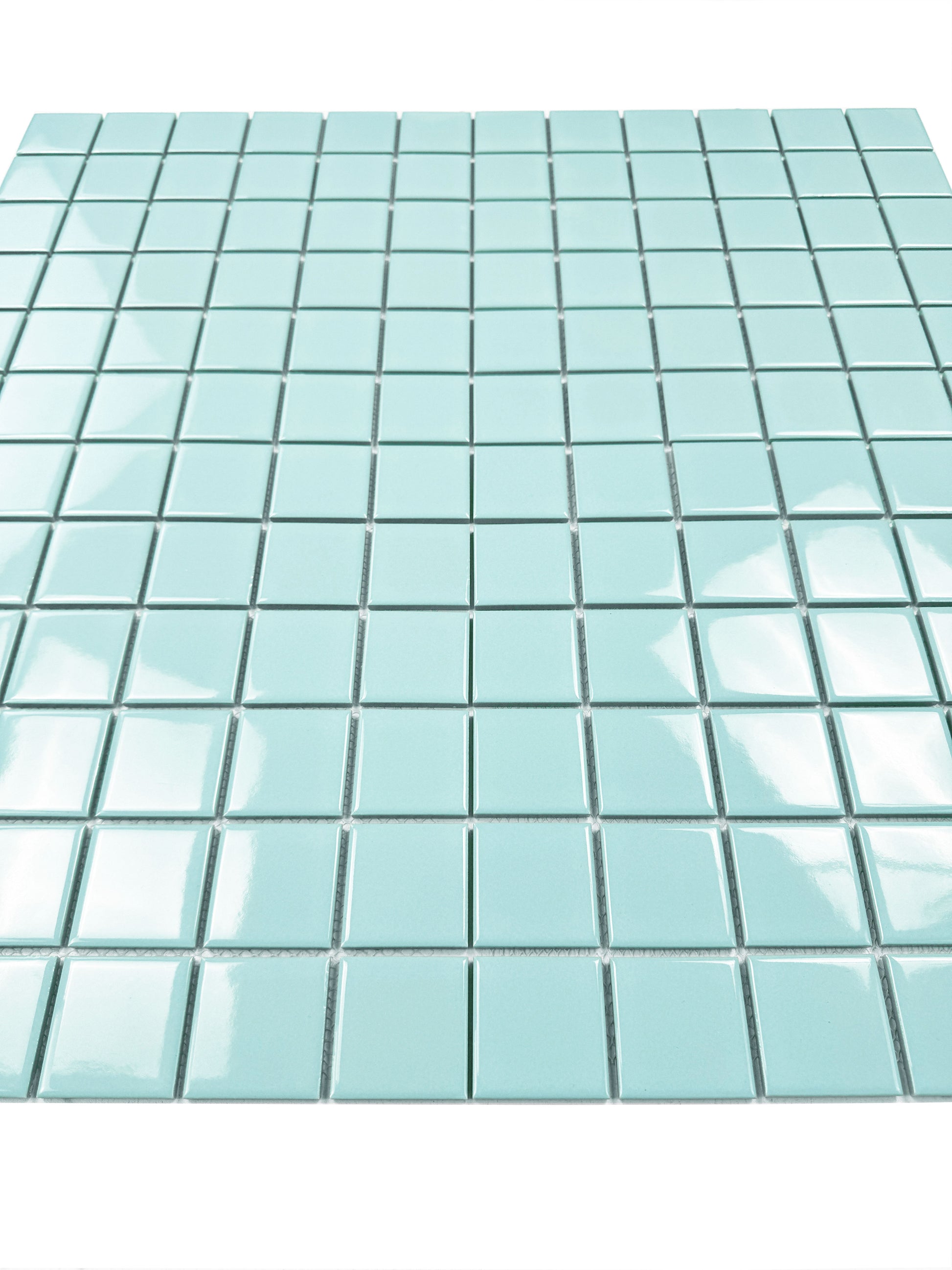 Light blue mosaic tiles on a white background