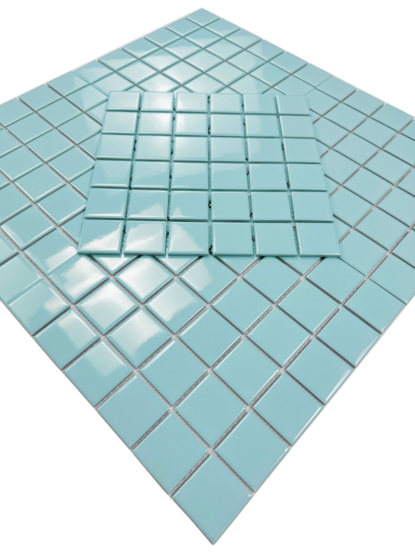 Blue tiles arranged in a diamond pattern on a white background