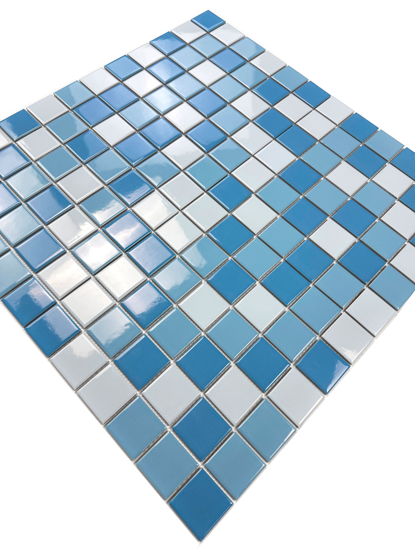 Mosaic tile sheet with blue and white tiles on a white background
