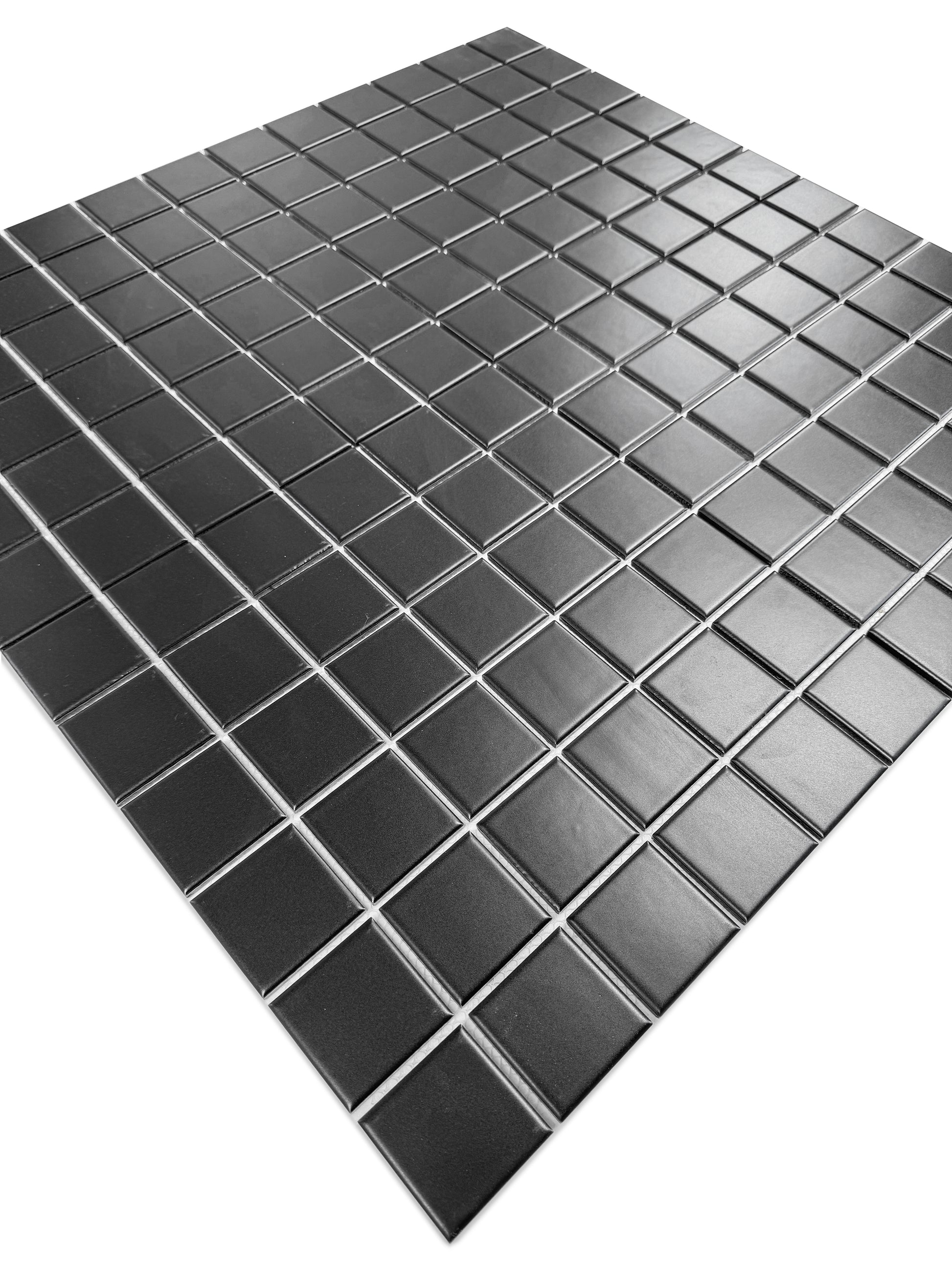 Black square tiles arranged in a grid pattern on a white background
