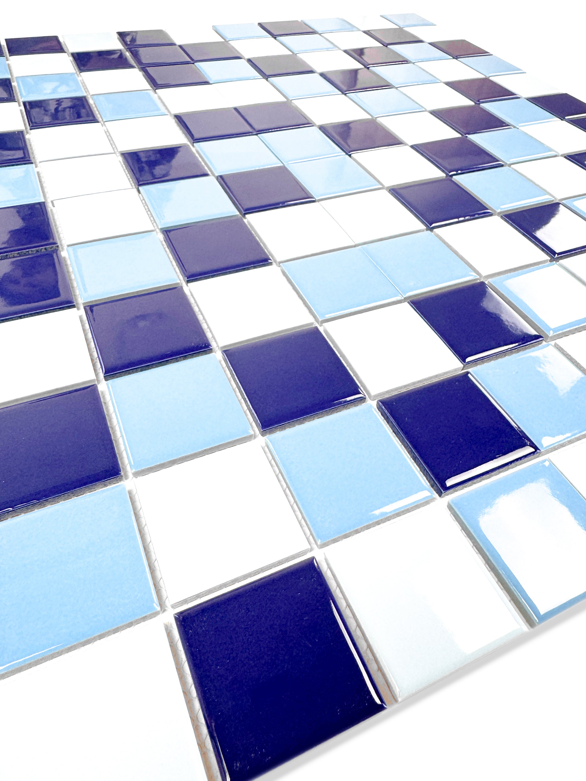 Mosaic pattern of blue, white, and light blue tiles.