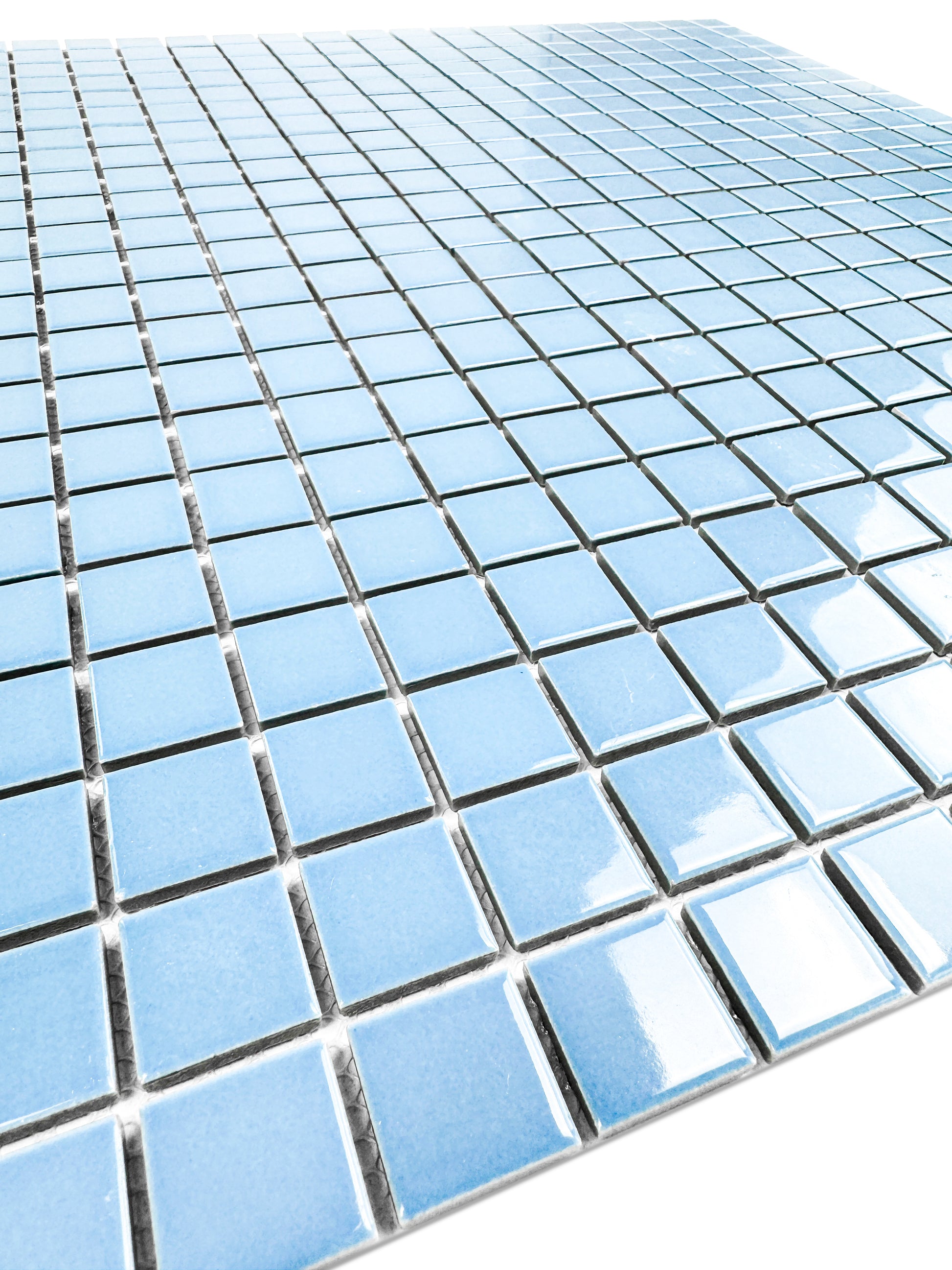 Close-up of blue mosaic tiles on a white background