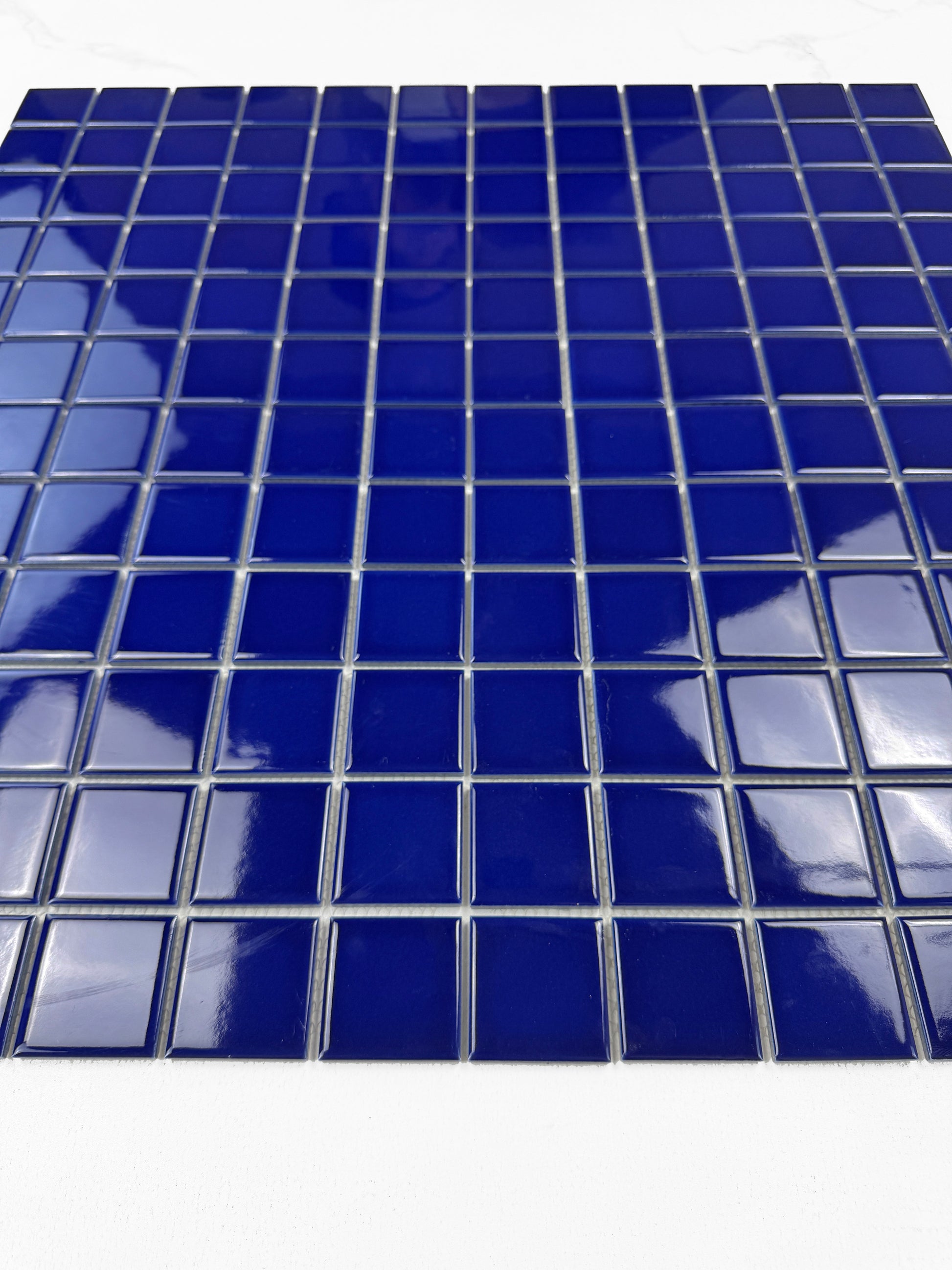 Blue square tiles on a white background