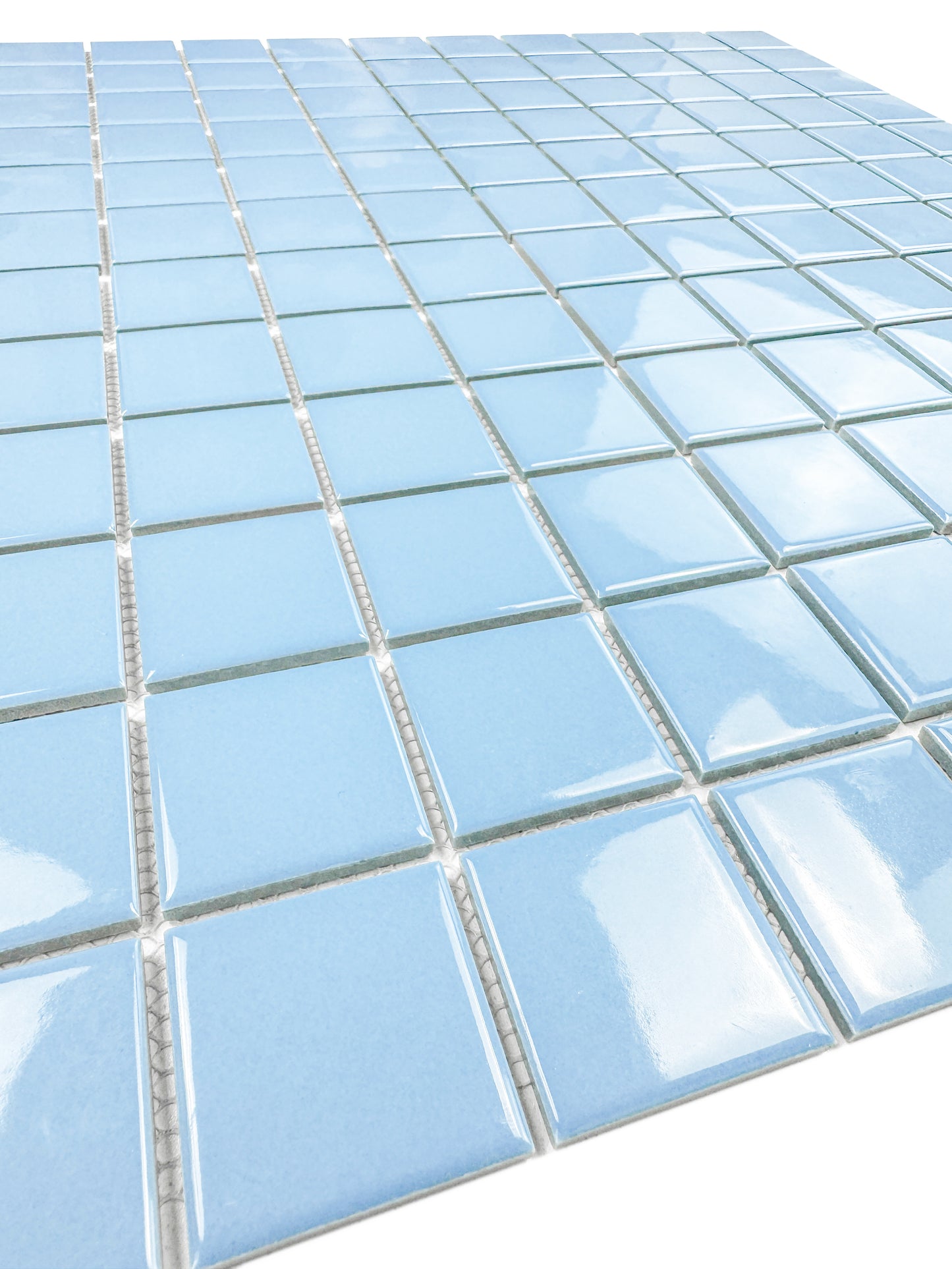 Close-up of blue mosaic tiles on a white background