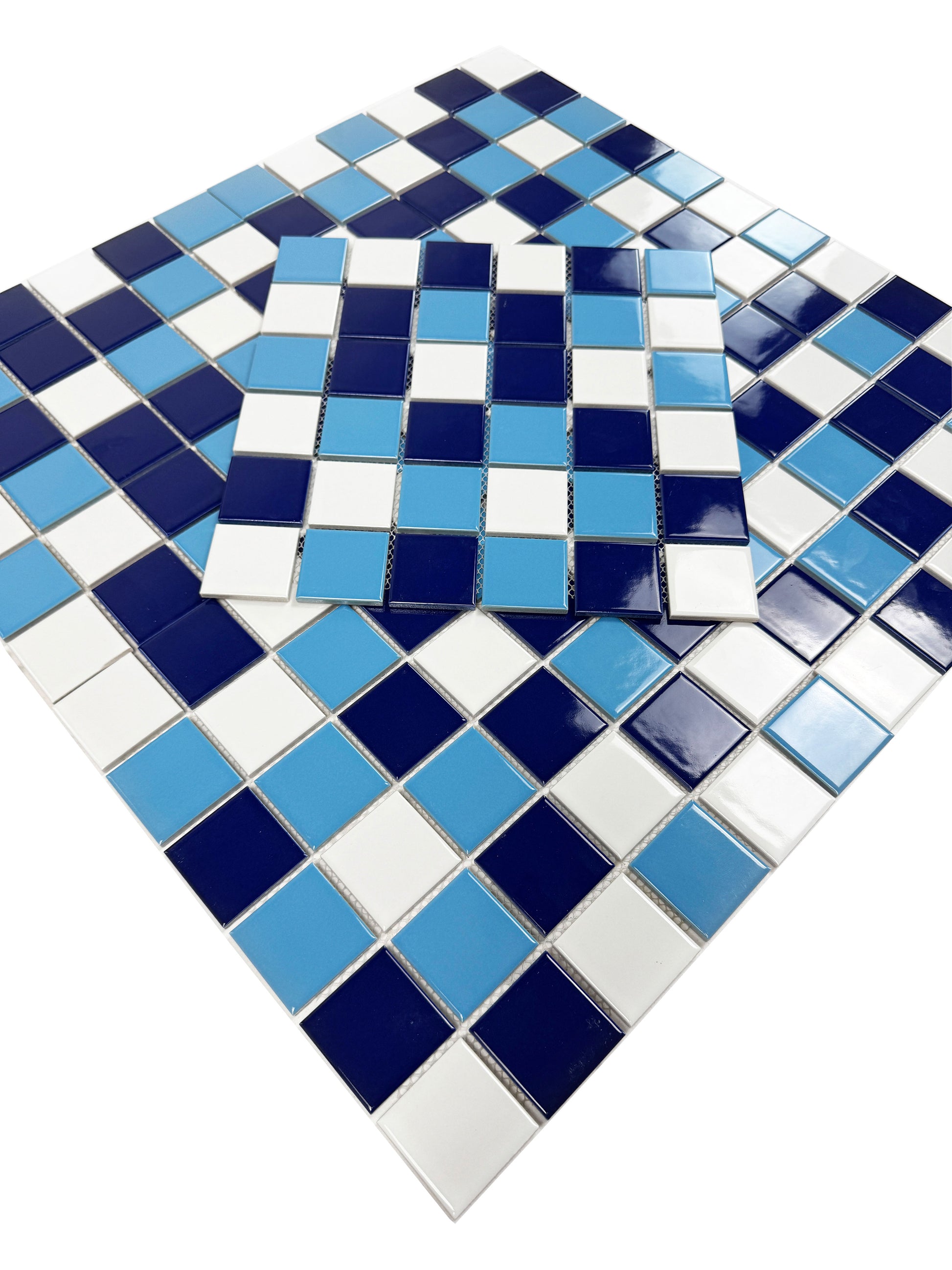 Mosaic tile with blue, white, and light blue tiles on a white background