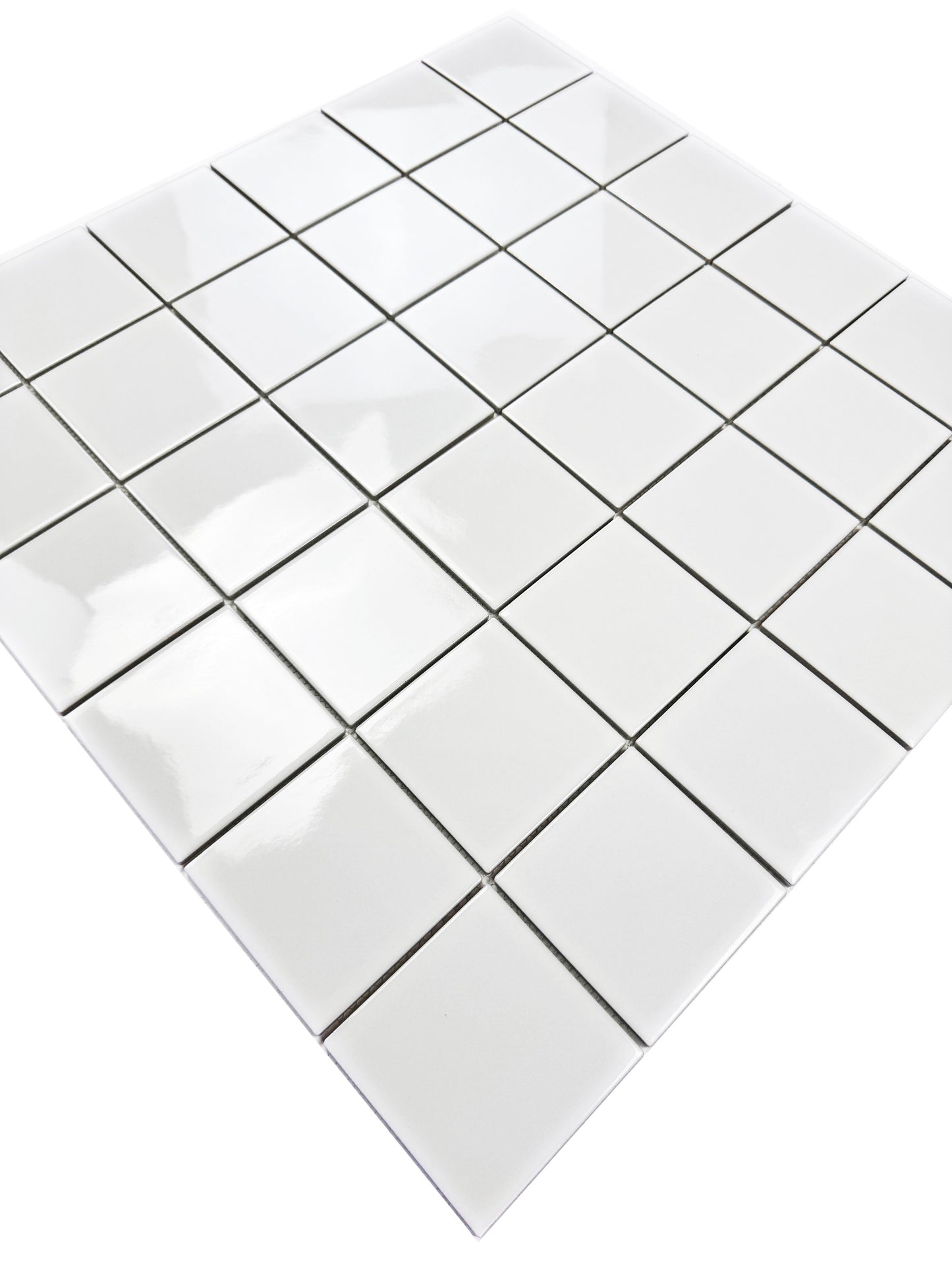White square tiles arranged in a grid pattern on a white background
