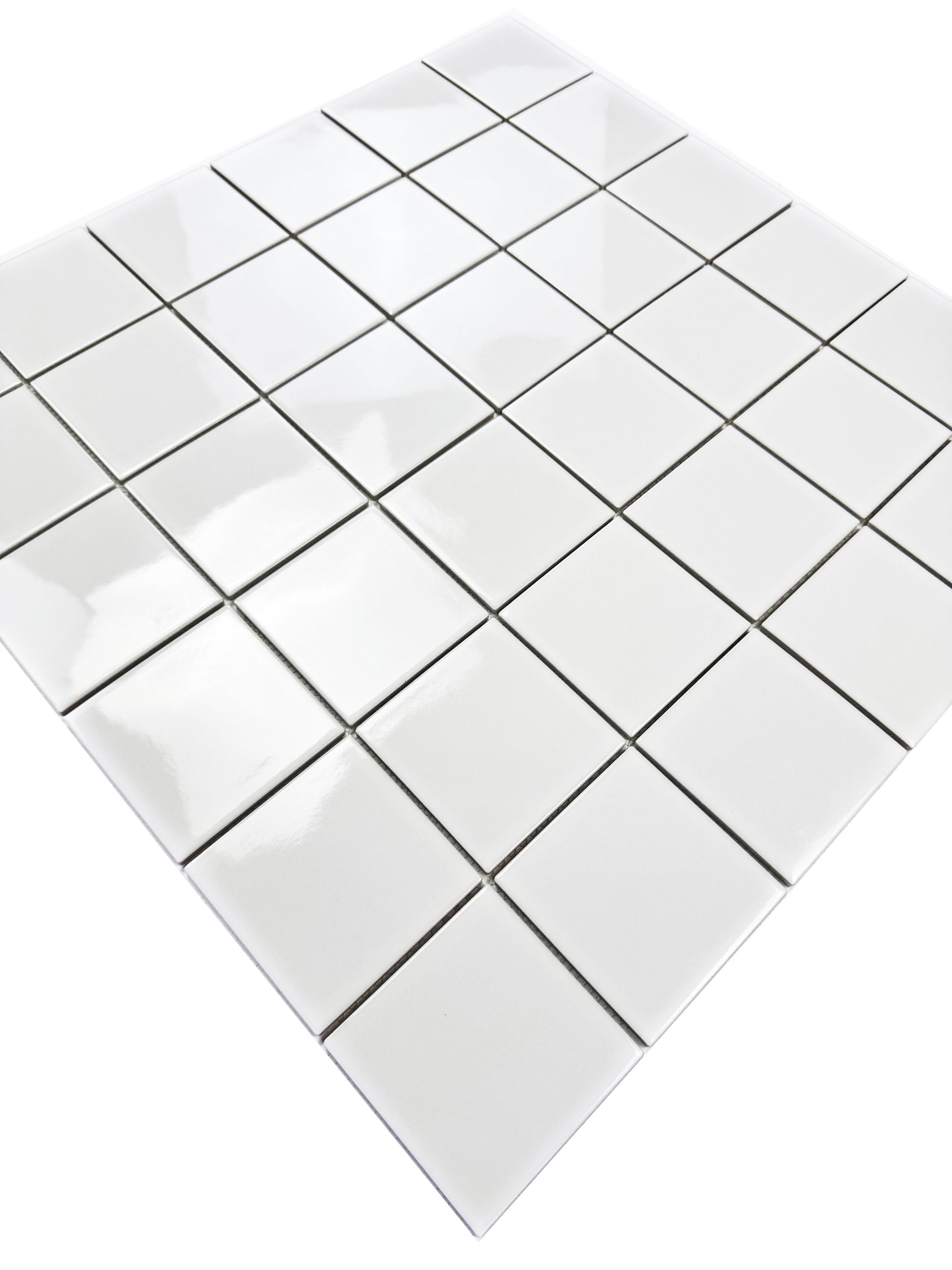 White square tiles arranged in a grid pattern on a white background